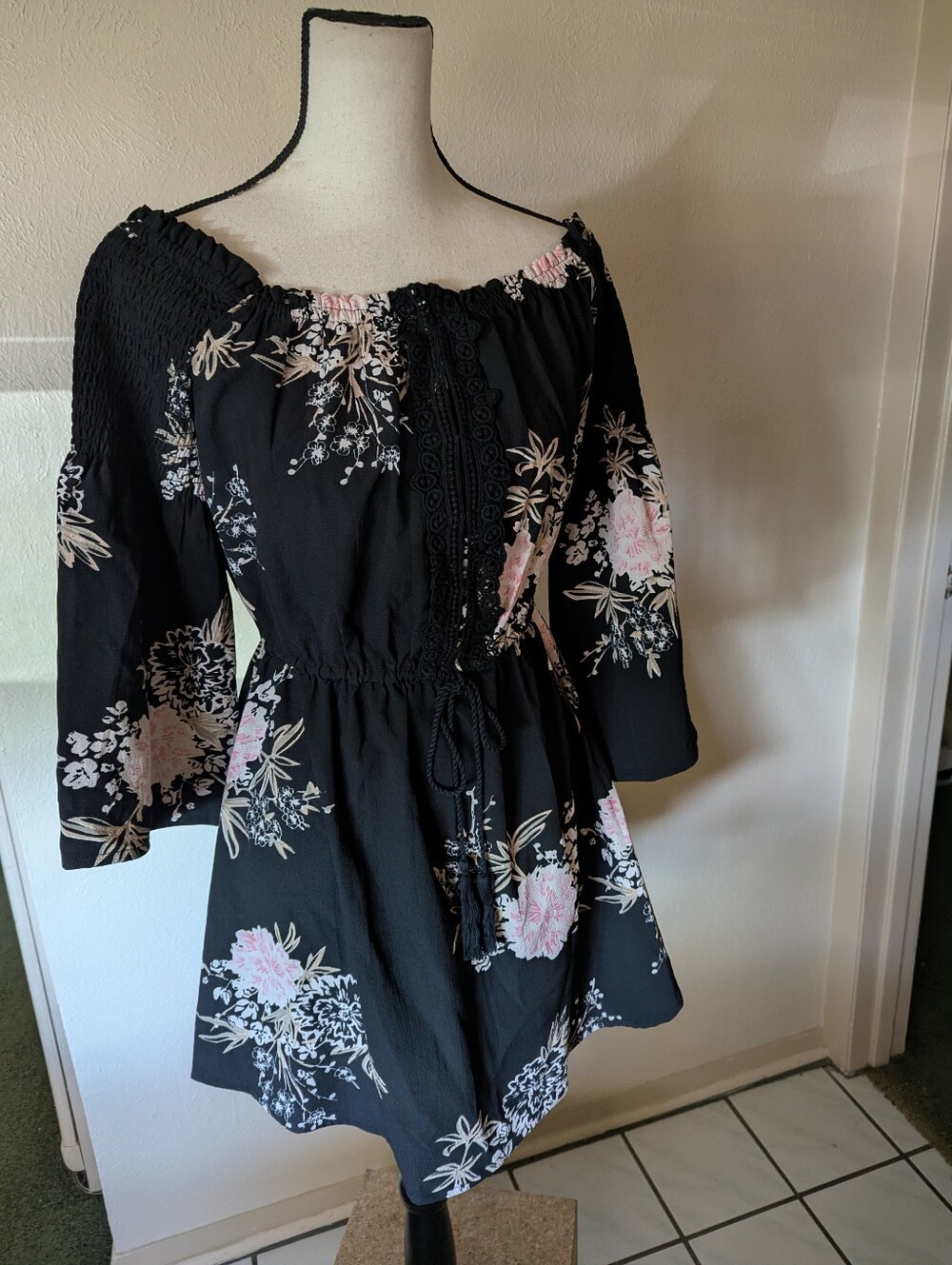 Women’s Black Floral Off-Shoulder Peasant Bohemian Style mini Dress.
